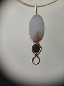 Silver and antique gold pendant with moss agate