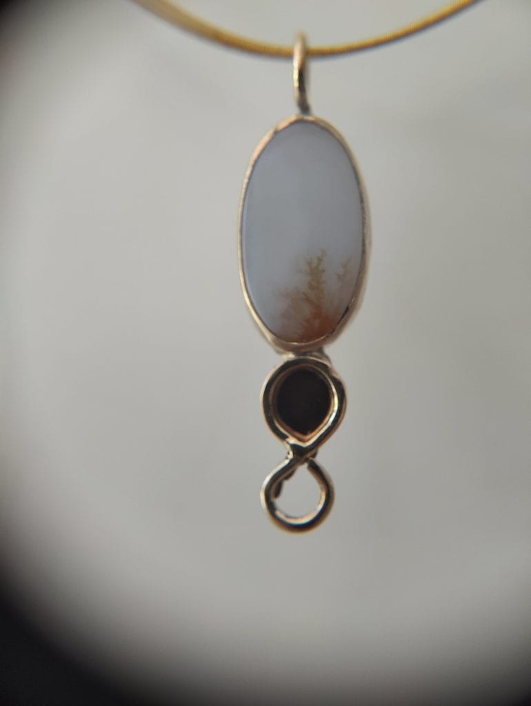 Silver and antique gold pendant with moss agate