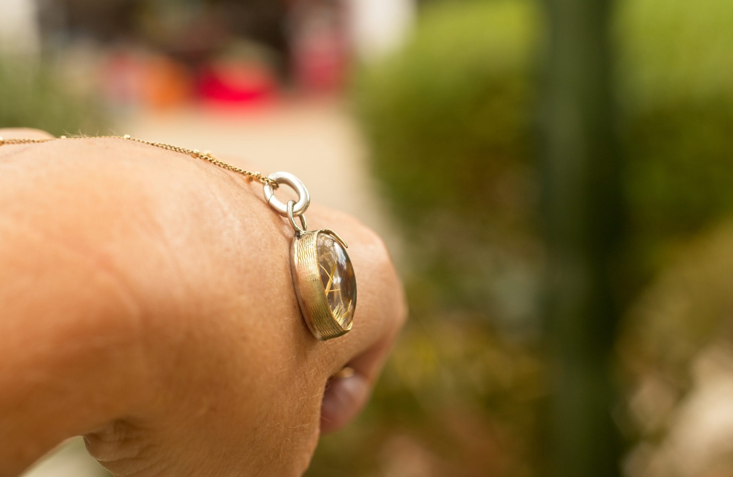 The Golden Illuminator: Rutile Quartz Pendant